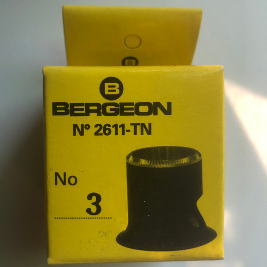 Bergeon 2611-TN-3 loupe with 3.3x magnification for precise watch accessory inspection and detail work.