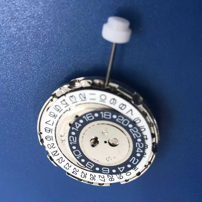 DG2813 automatic watch movement with 3 hands and 24-hour display in silver finish for precise timekeeping.