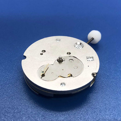 DG2813 automatic watch with silver dial, small seconds at 9 o'clock, and single calendar display.