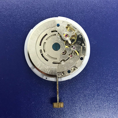DG2813 automatic mechanical watch movement with day-date function, silver finish, ideal for replacements.
