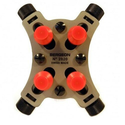 Bergeon 2820 Universal Vice holding waterproof watch up to 44mm for precision repairs.