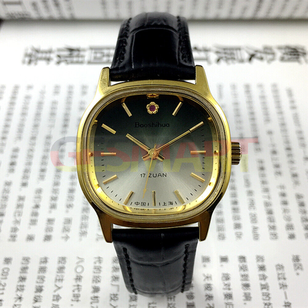 Shanghai 34mm manual mechanical watch with green dial, golden nail markers, round case, 17 jewels, classic design.