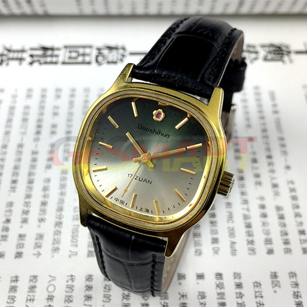 Shanghai 34mm manual mechanical watch with golden nail markers, green dial, round case, 17 jewels.