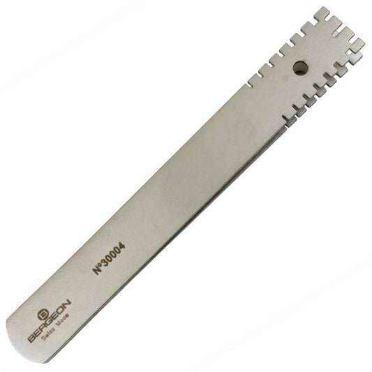 Bergeon 30004 brass tweezers holding watch hands precisely for repair and assembly.