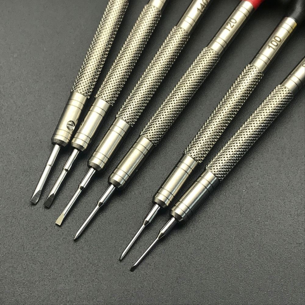 316 Stainless Steel watchmakers screwdriver set, ergonomic handles for precise watch accessory repairs.