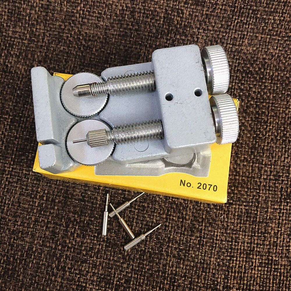 Adjustable metal link remover tool with 4 pins for watch band repair.