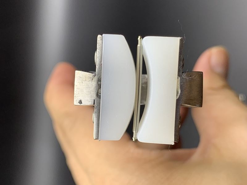 Spring shaft pliers for precise watchband adjustment with steel bracelet and ear rod.