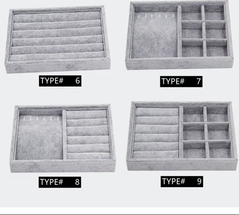 Gray velvet stackable jewelry organizer tray, perfect for neatly storing rings, bracelets, and necklaces.