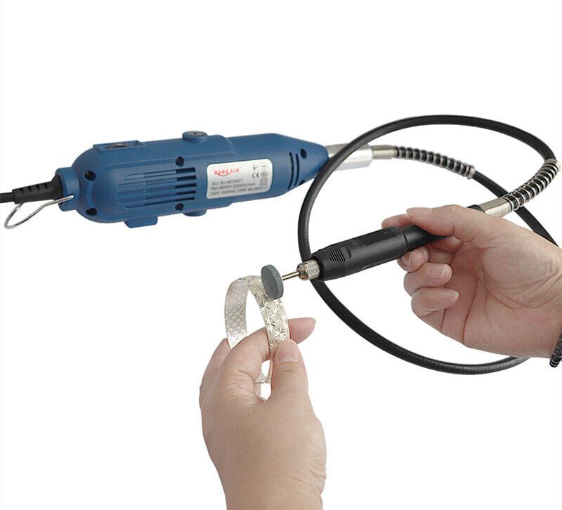Compact electric grinder for precise polishing, cutting, and drilling tasks on watch accessories.