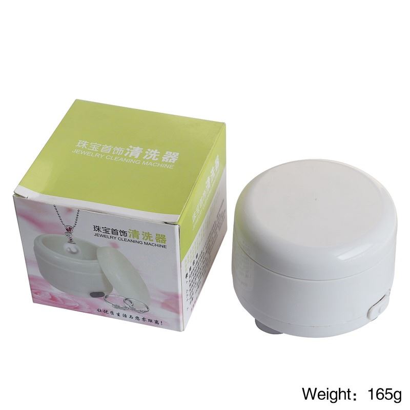 Compact Mini ultrasonic cleaner for jewelry, watches, eyeglasses, and dentures cleaning.