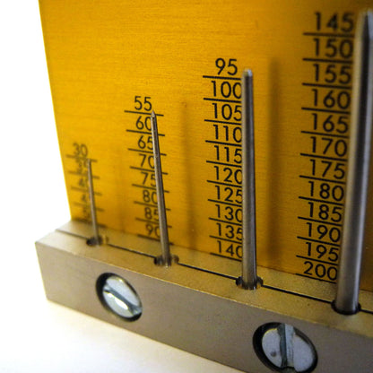 Bergeon 30464 watch hand gauge measuring precise hole sizes for watch repair and adjustments.