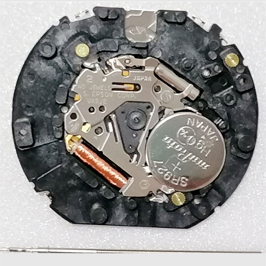 Hattori Epson VX9JE quartz watch movement, precision Japan-made component for repairs.