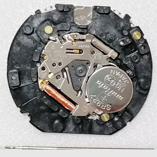 Hattori Epson VX9JE quartz watch movement, precision Japan-made component for repairs.