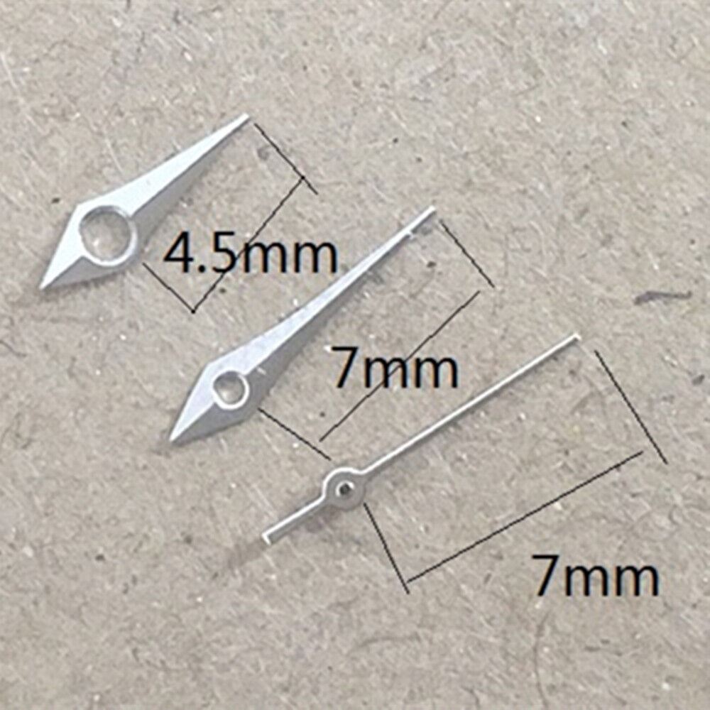 Silver watch hands set for Miyota 2035 quartz movement, enhancing precision and style.