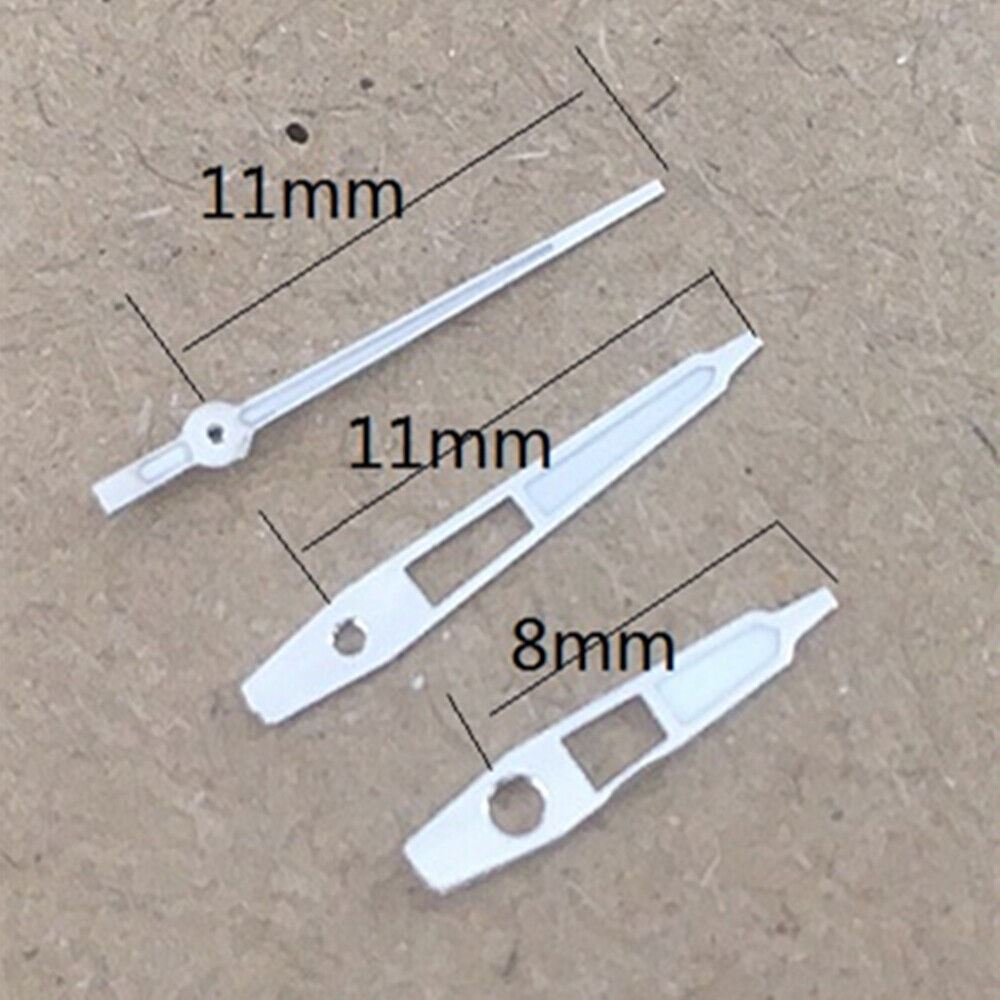 White luminous watch hands compatible with Miyota 2035 quartz movement, enhancing visibility and style.