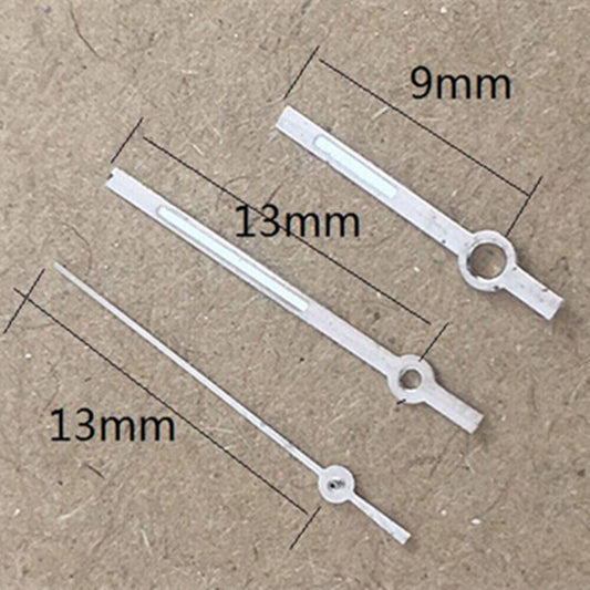 White luminous watch hands with trim for Miyota 2035 quartz movement, enhancing clarity and style.