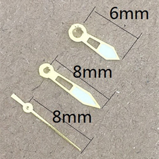 Golden trim lume watch hands for Miyota 2035 movement, enhancing visibility and style.