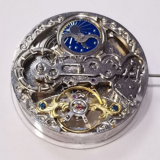 Silver automatic mechanical watch with hollow moon phase at 12 o'clock, elegant 3-hand design