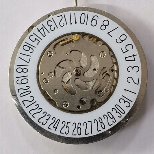 Silver automatic watch with mechanical movement, big date wheel, and small seconds at 3 o'clock.