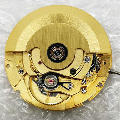 Tianjin 2824-2 automatic watch movement showcasing golden and black dial with precise mechanical gears.