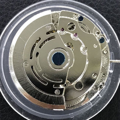 Nanning 2813 mechanical watch movement featuring moon phase at 6 o'clock and small seconds, China-made detail.