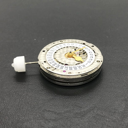 China Made 3186 Automatic GMT watch movement showcasing engraved blue balance spring and precision craftsmanship.