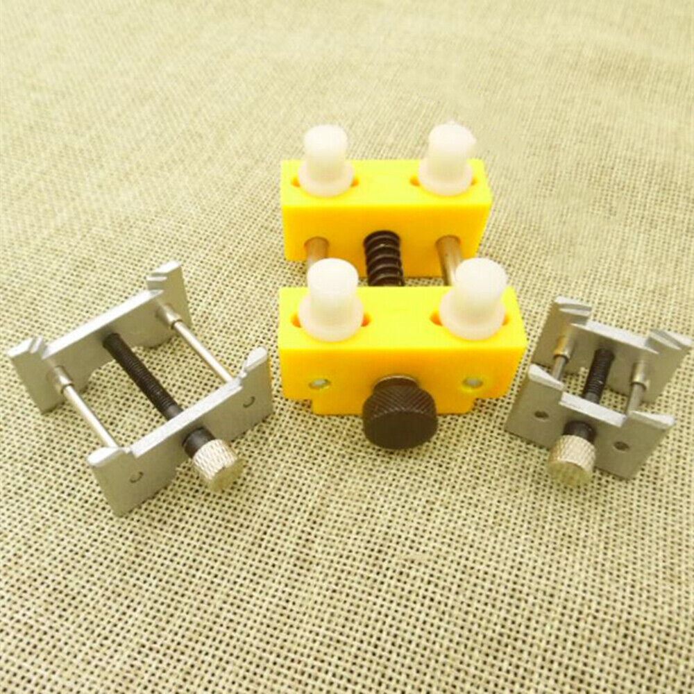 Versatile 4-in-1 extensible movement holder clamp, plastic alloy, ideal for precise watch repairs.