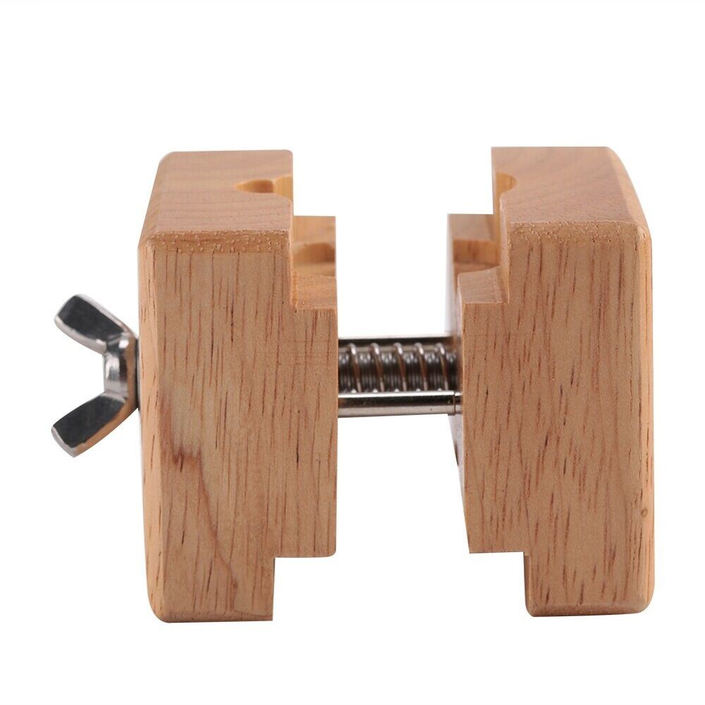 Wooden watch case holder block, perfect for stable watch repair and maintenance tasks.