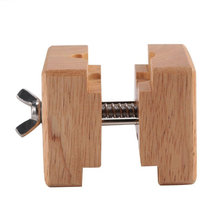 Wooden watch case holder block, perfect for stable watch repair and maintenance tasks.