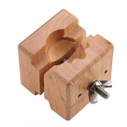 Wooden watch case holder block, perfect for stable watch repair and maintenance tasks.