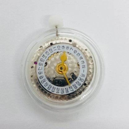 3186 Movement with GMT function, engraved details, and blue balance spring for precise watch performance.