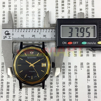 37mm Shanghai manual mechanical watch with single calendar, black dodecagonal case, elegant precision timepiece.