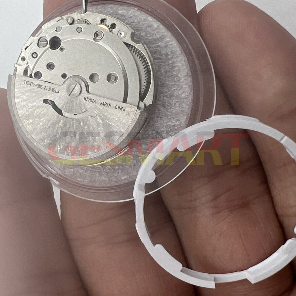 Miyota/Citizen 8215 automatic watch movement with black dial, date at 6, precision Japanese engineering for watch accessories.