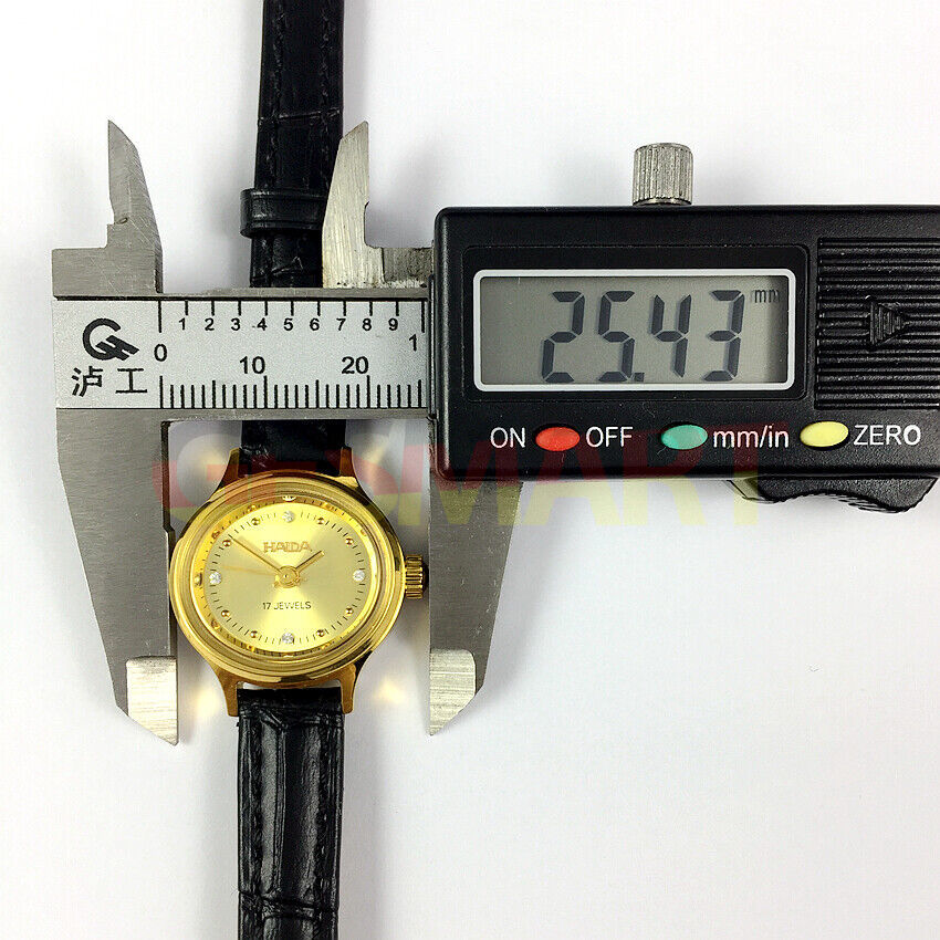 24mm HAIDA mechanical lady watch with oval gold case and sparkling imitation diamond accents.