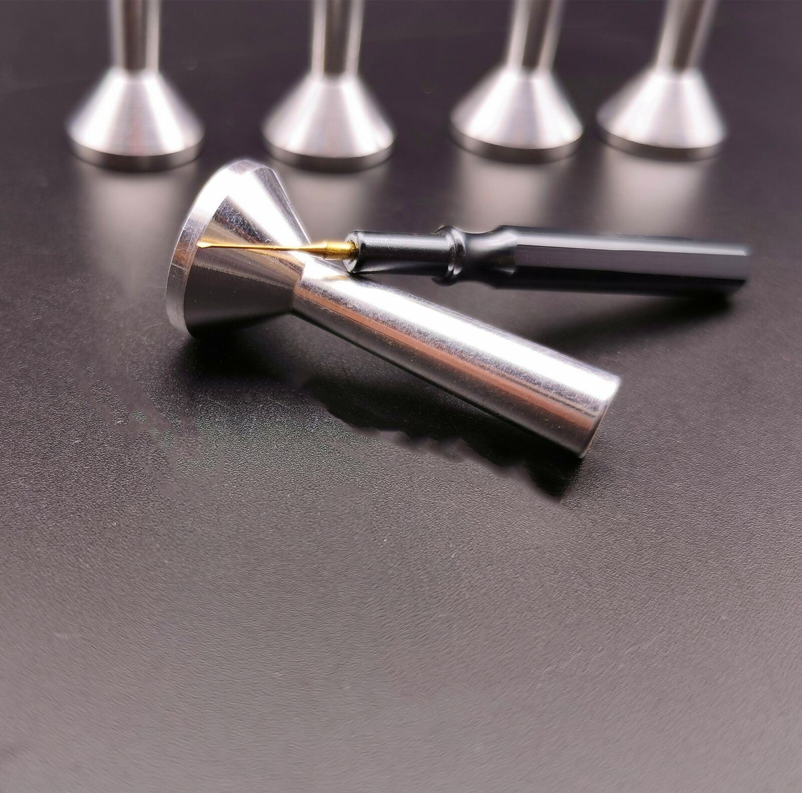 Watchamkers set of 5 metal lubricants for precision watch oiling, improving performance and durability.