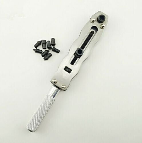 Watchamaker's adjustable back case remover wrench with 8 tips for precise watch repair and battery replacement.