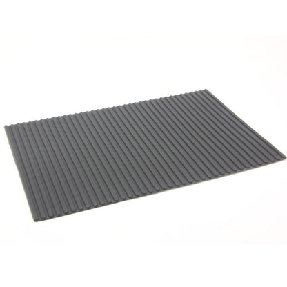 Heat-resistant non-slip pad mat 30x21mm with adhesive backing for secure watch repair use.