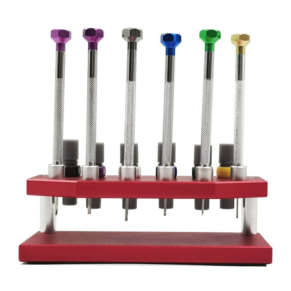 Precision watch screwdriver set with extra blades and stand for watch repair and maintenance tasks.