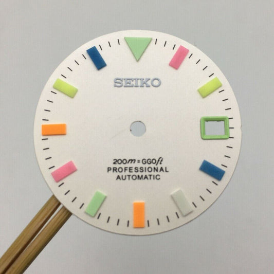 Colorful 28.5mm watch dial with luminous markers, NH35 movement, ideal for watch parts replacement.