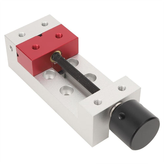 Compact 50mm aluminum clamp bench vise for secure drill press and carving tool fixing.