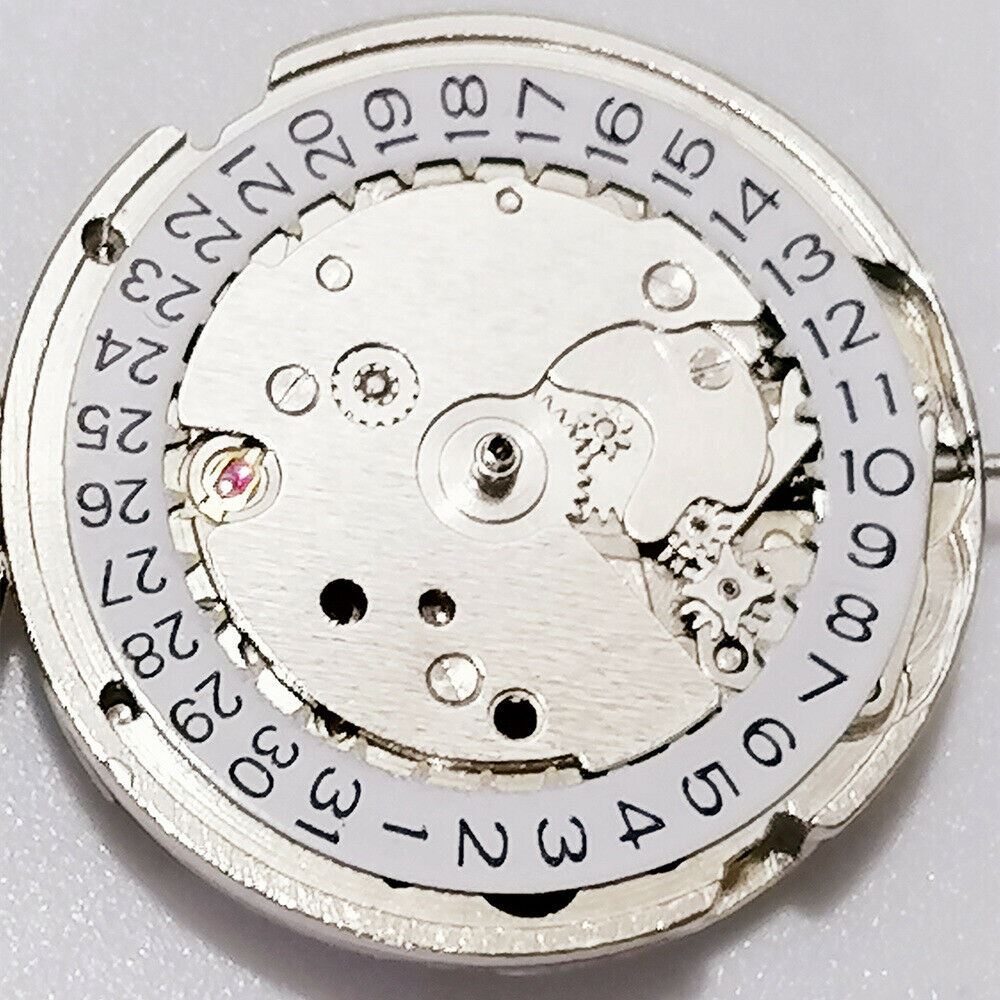 26.5mm 7120 automatic mechanical watch movement with single calendar and 3 hands for precision timekeeping.