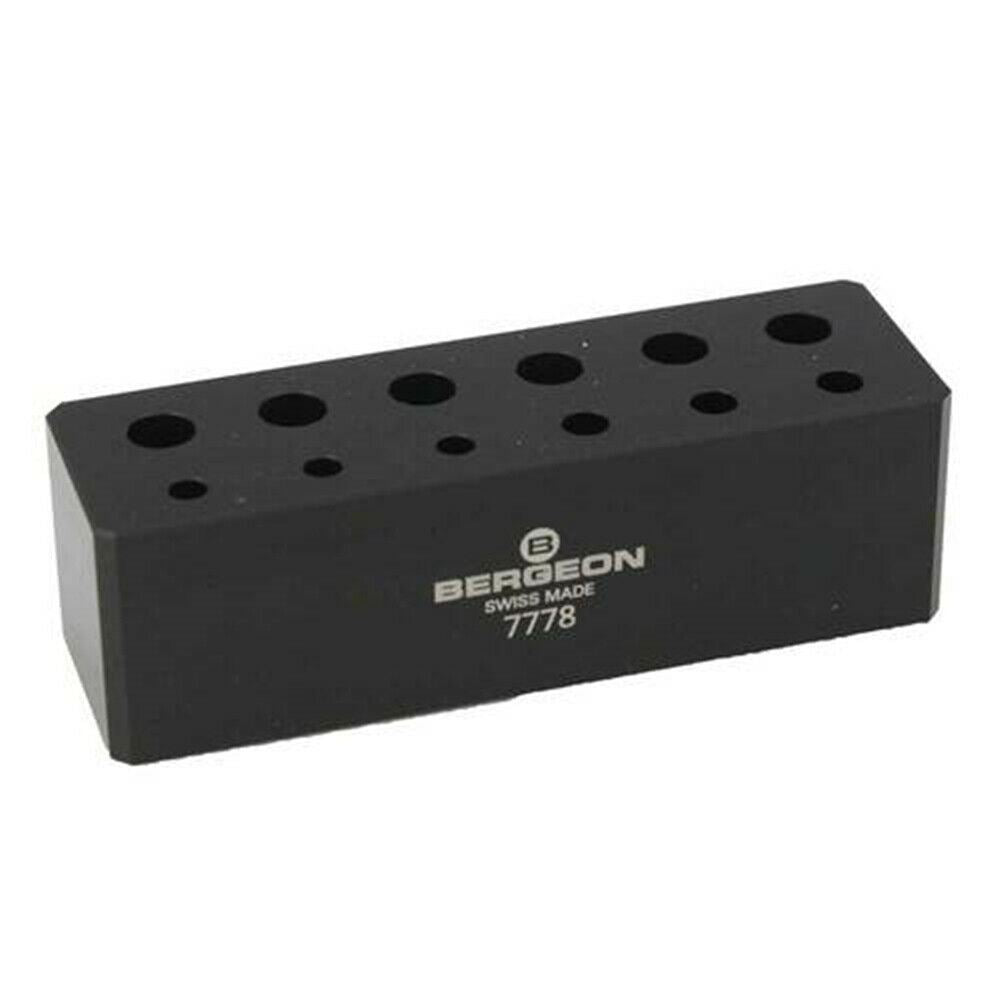 Bergeon 7778 6-piece watch screwdriver set with spare blades and organized stand for precision repair tasks