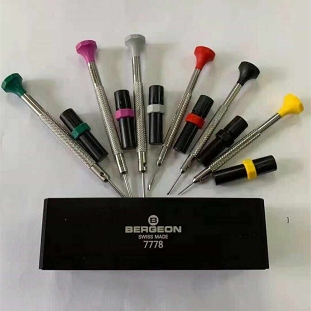 Bergeon 7778 precision 6-piece watch screwdriver set with spare blades and organized stand for repair tasks