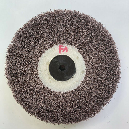Bergeon 6085-F1 aluminum oxide polishing brush with medium grain abrasive wheels for watch accessory refinishing.