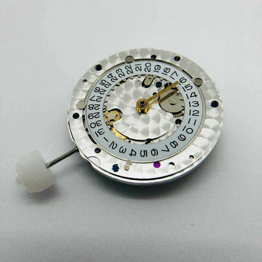 SH3135 watch movement with full engraving and blue balance spring, showcasing precise craftsmanship.
