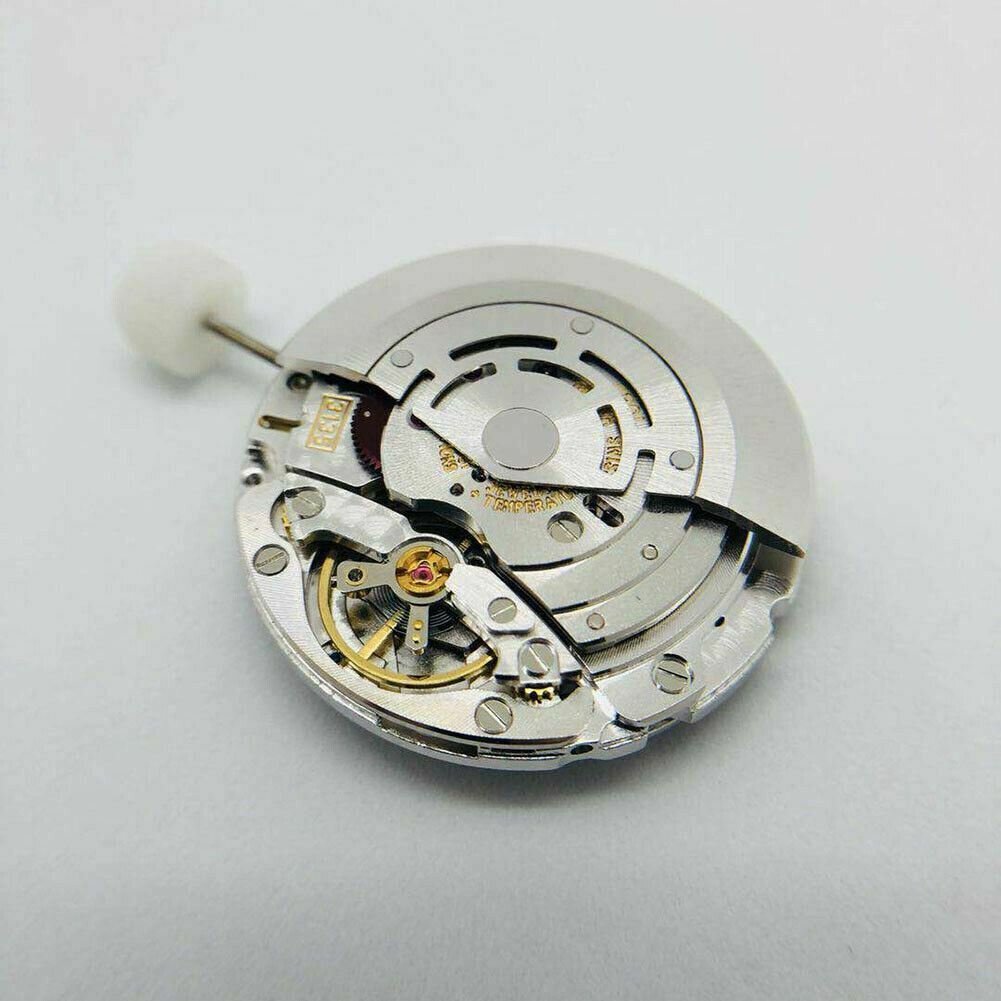 SH3135 watch movement featuring full engraving and blue balance spring, highlighting precise Swiss craftsmanship.