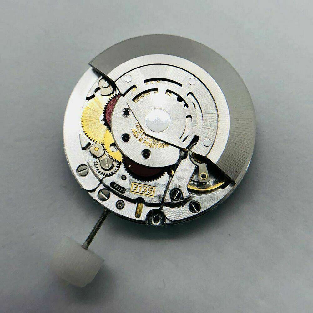 SH3135 watch movement with detailed engraving and blue balance spring, highlighting Rolex precision craftsmanship.