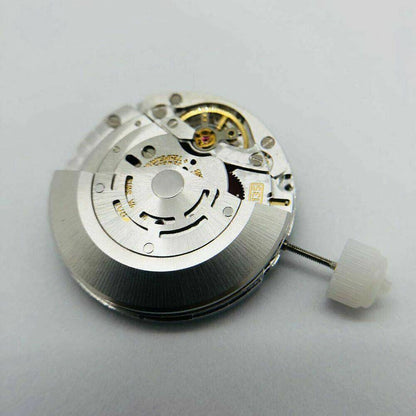 SH3135 watch movement with detailed engraving and blue balance spring, highlighting precision craftsmanship.