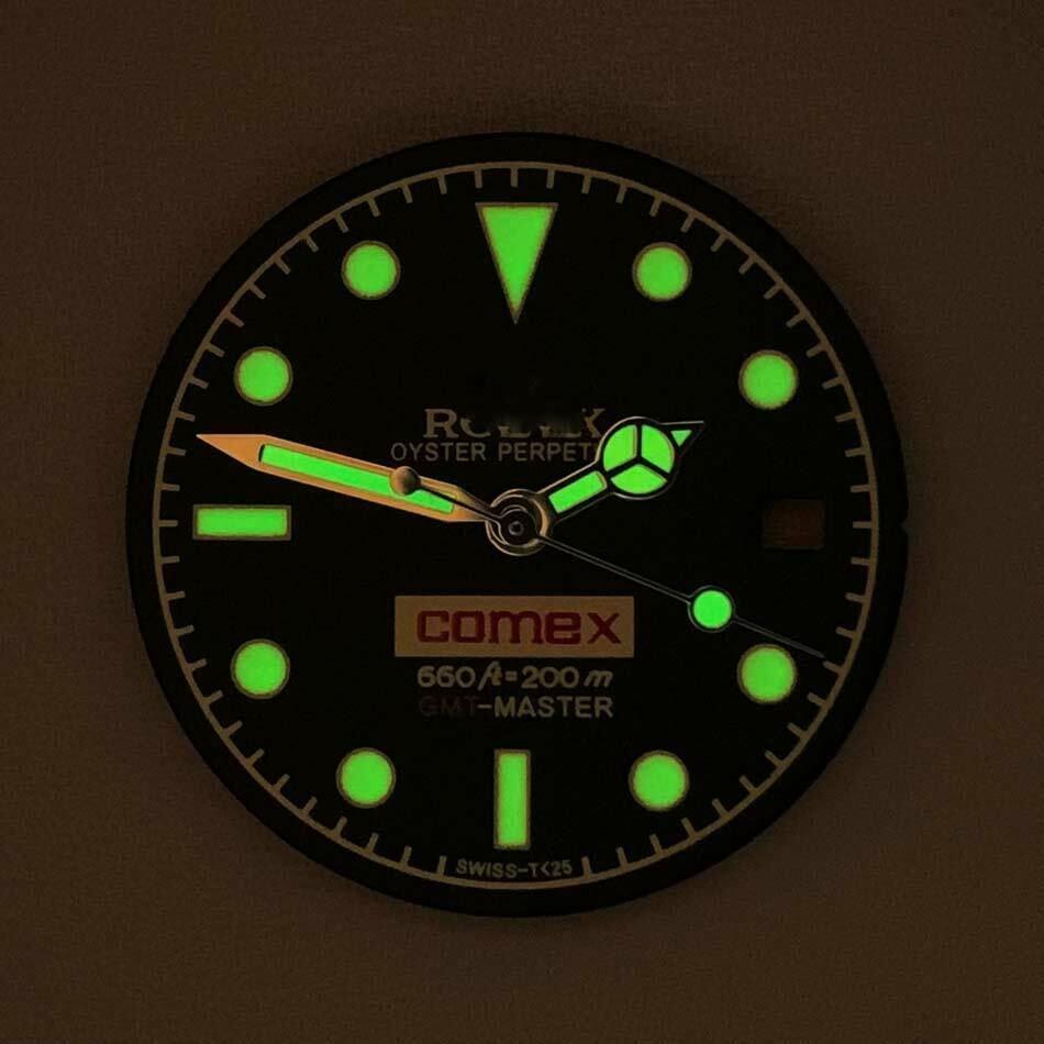 Blue-green luminous RLX watch dial with hands, designed for 8215/2813/8200 movements, ensuring precise timekeeping.