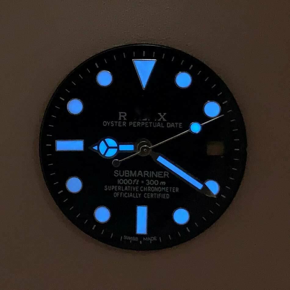 Blue-green luminous RLX watch dial with hands, compatible with 8215/2813/8200 movements for precise timekeeping.